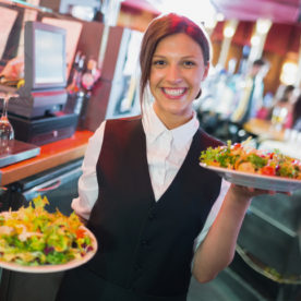 Waitress serving food