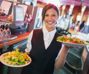 Waitress serving food