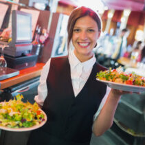 Food handler serving food